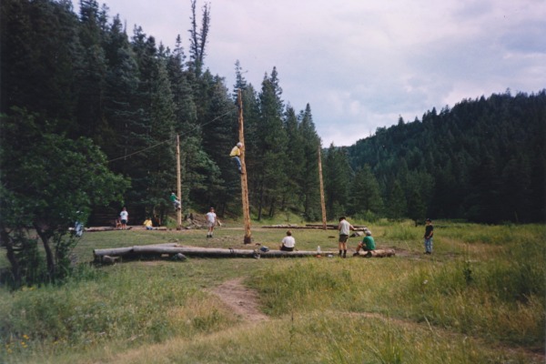 Some random people climbing spar poles